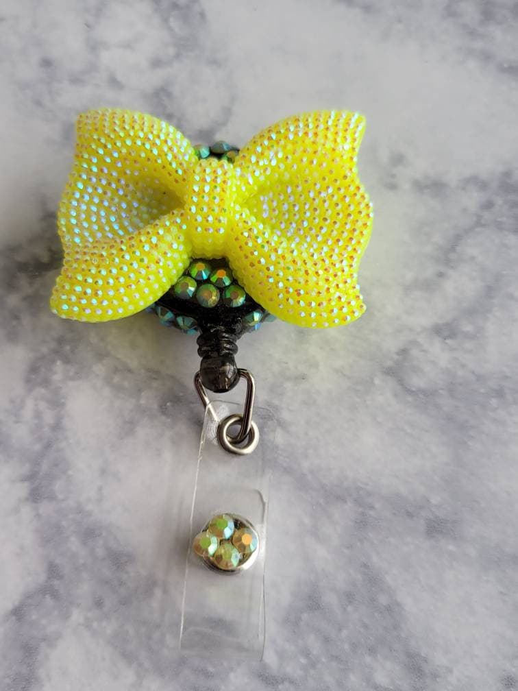 Iridescent Bow Badge Reel
